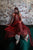 Hepburn halter dress with a hand tooled leather lace bodice a silk crepe de chine scarf and silk full length pleated skirt